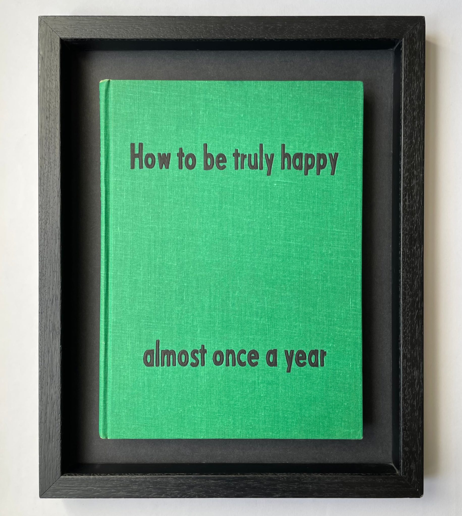 capa de livro emoldurada: how to be truly happy almost once a year